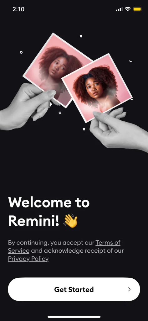 Welcome screen of the Remini app featuring two hands holding images of a woman with curly hair. The screen includes a 'Get Started' button and a greeting message stating 'Welcome to Remini!' with a waving hand emoji.